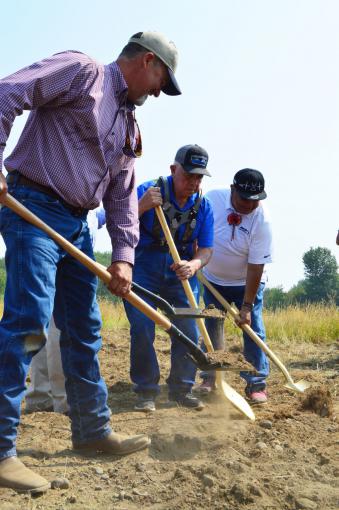 Groundbreaking August 2018. (L-R): Daniel Brownlee (hatchery manager), Mel Sampson, and Davis Washines (YN)