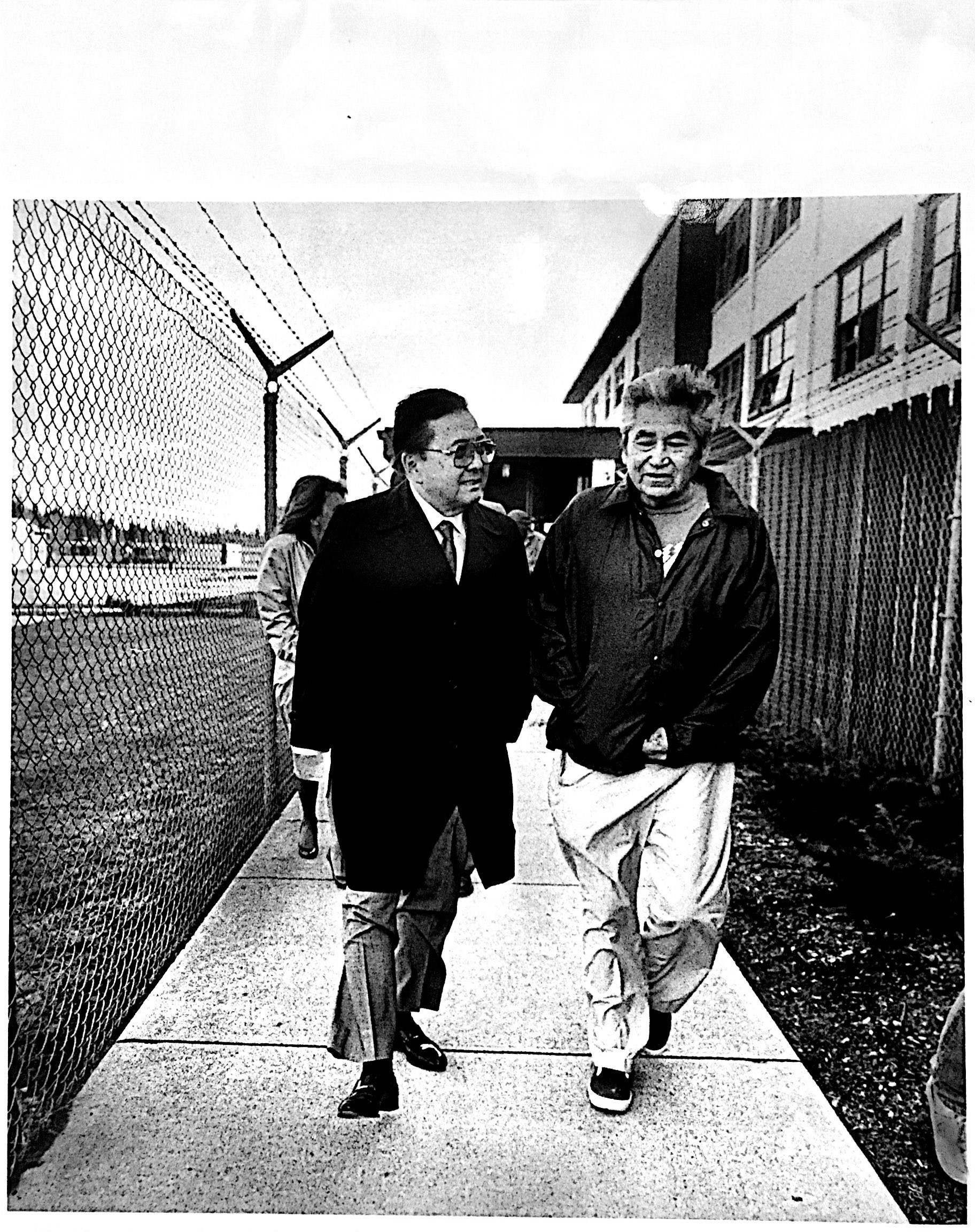 Senator Inouye walks with David Sohappy in jail